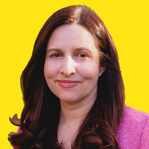 Francie Alexandre headshot yellow background