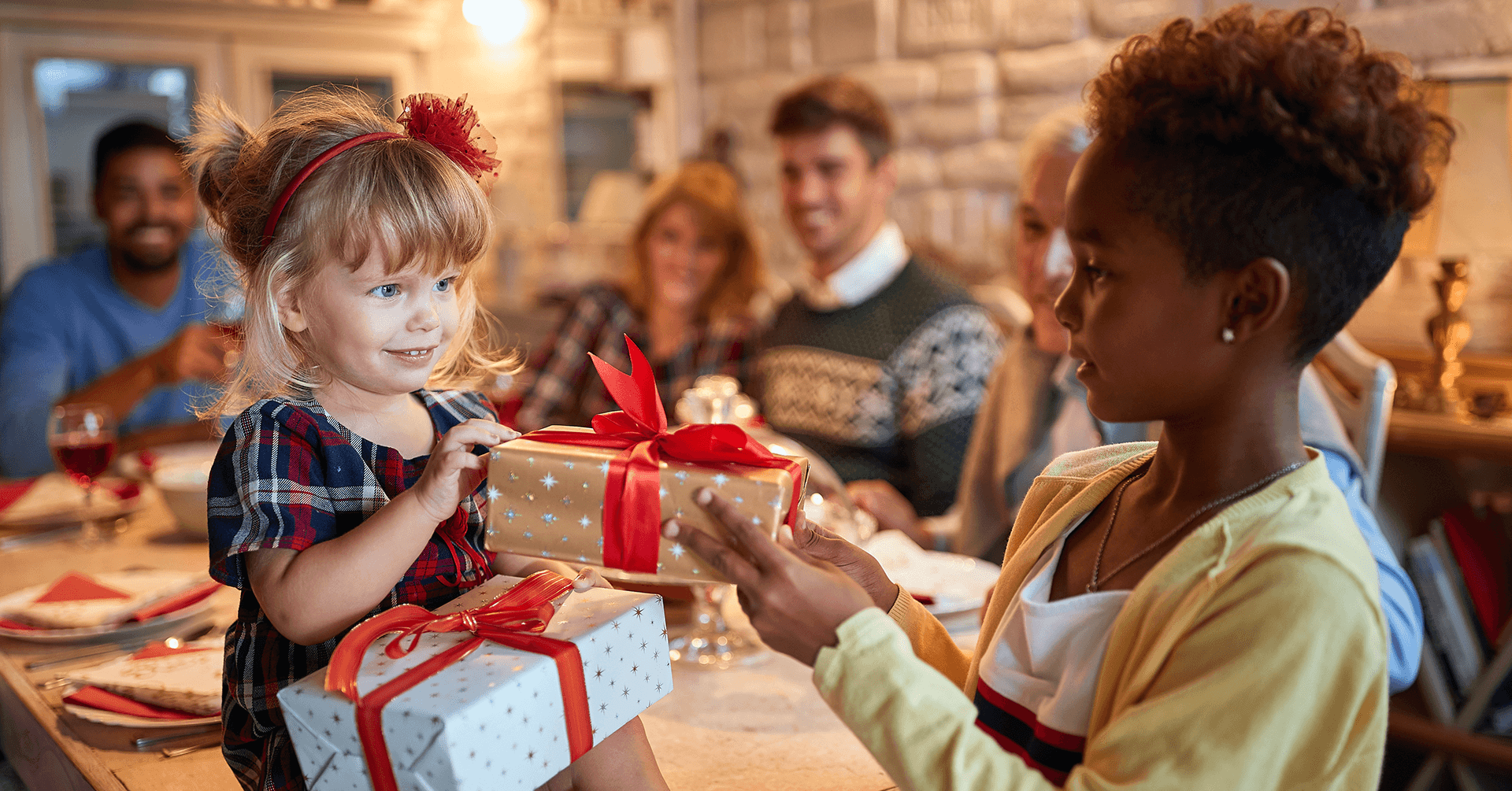 Kids exchanging holiday gifts